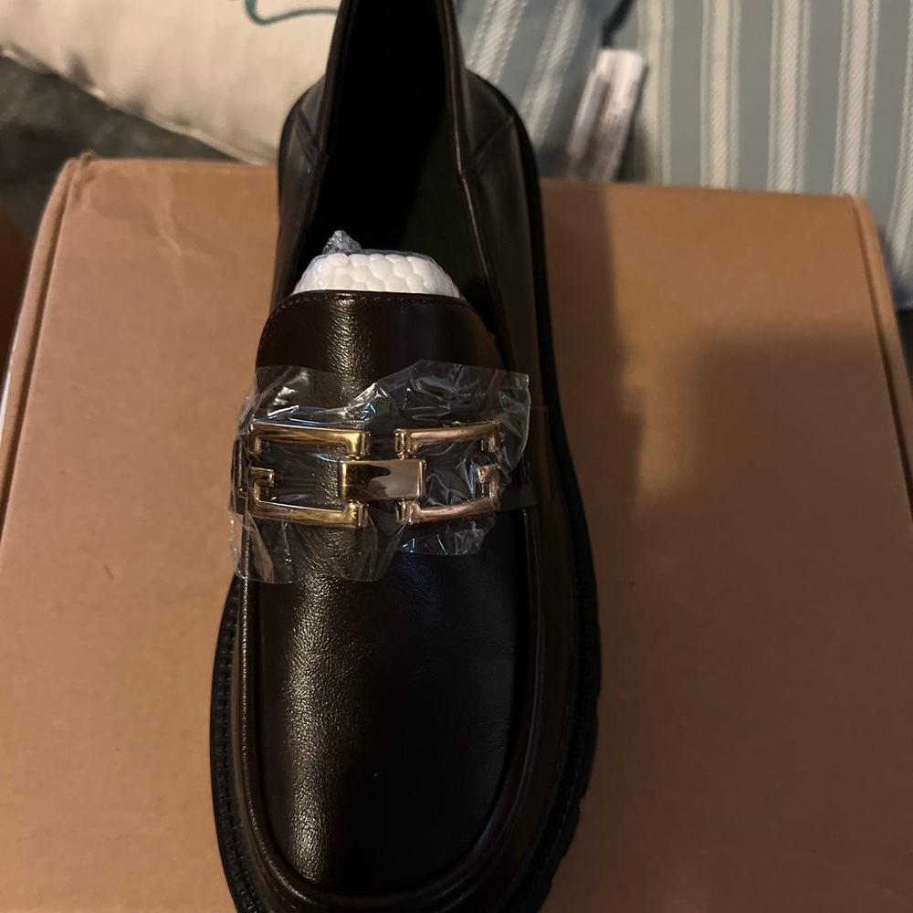 Both pair are the same style they are penny loafer style with a wedge